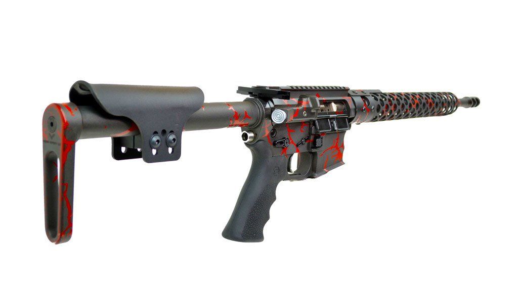 Red and black customized AR-15 rifle, angled against a white background.