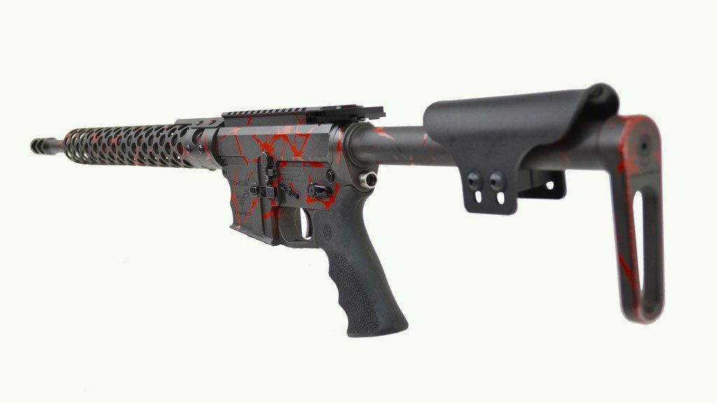 Black and red AR-15-style rifle with a custom finish.