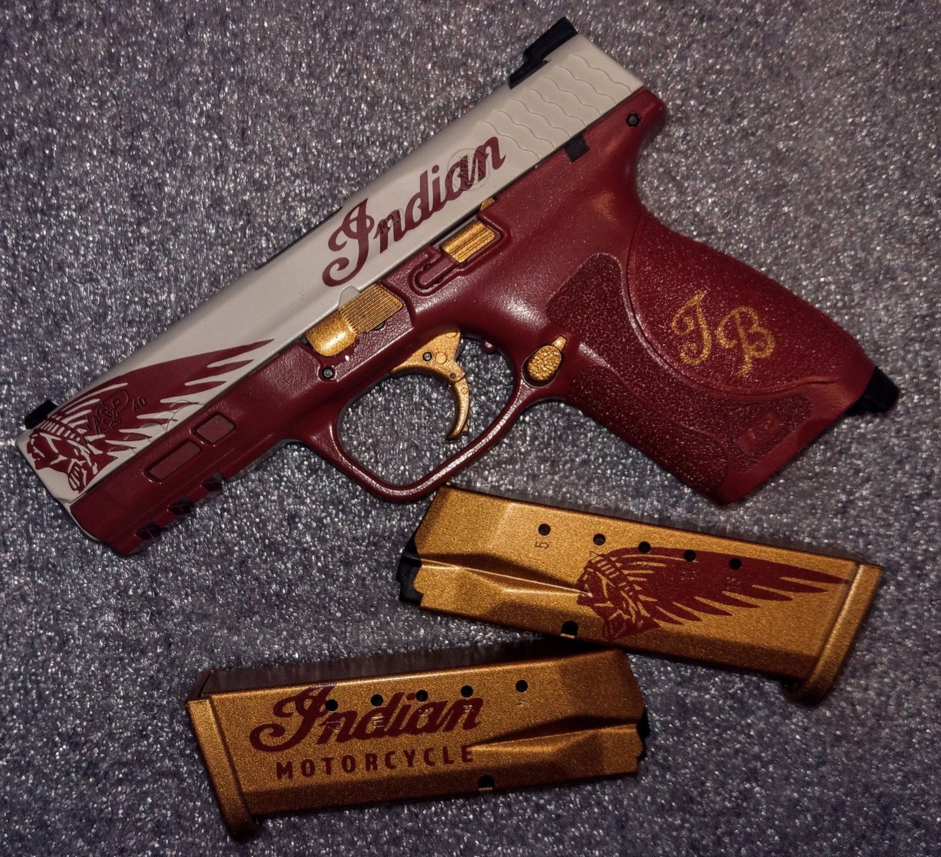 Customized red and white handgun with