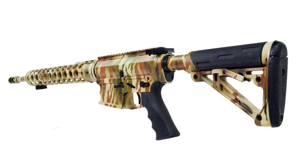 Camouflage patterned rifle, side view.
