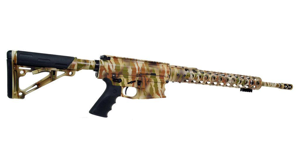 Camouflage-patterned AR-15 rifle on white background, with black grip and stock.