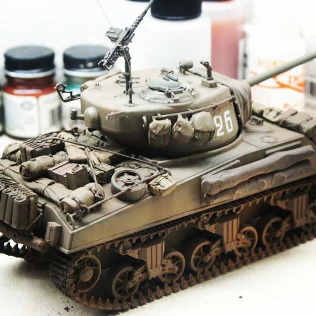 Model Sherman tank, olive drab with weathered details, number