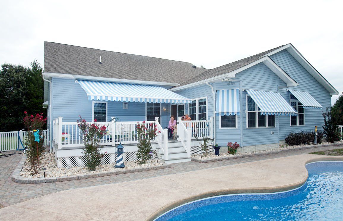 awning over deck in pool area