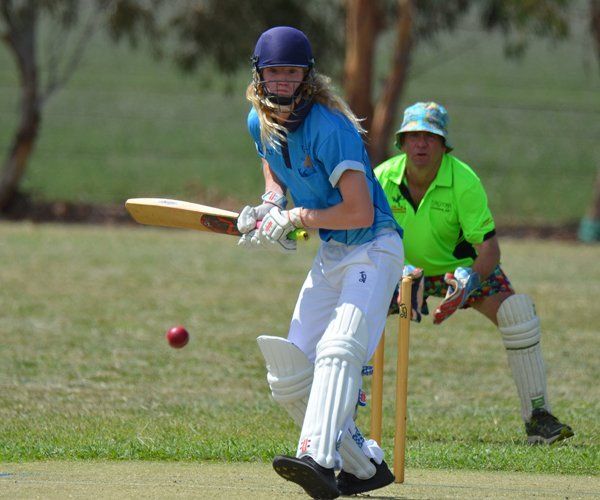 playing in cricket field