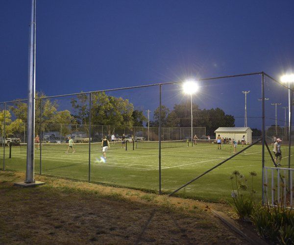 playing in tennis court