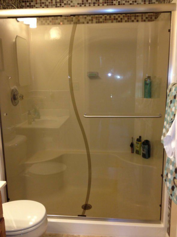 Bathroom Glass — Illuminated Bathroom with Glass Enclosure In Columbus, IN