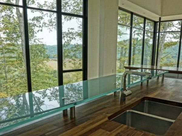 Glass Installations — Glass Table on a Commercial Building in Columbus, IN