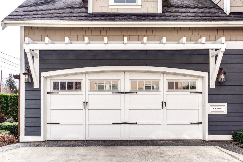 Courtyard White Stockbridge Door — Everett, WA — Overhead Doors Everett Courtyard White Stockbridge Door — Everett, WA — Overhead Doors Everett