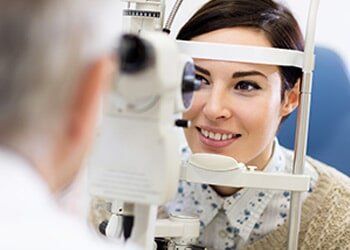 Woman look in ophthalmoscope — general in Yorktown, VA
