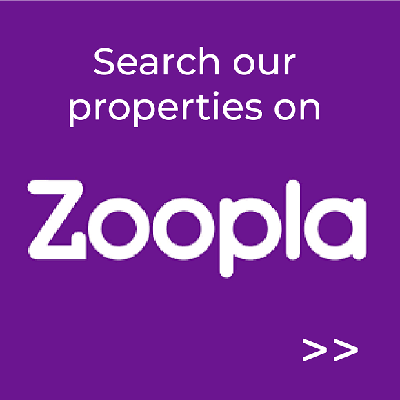 A purple sign that says `` search our properties on zoopla ''