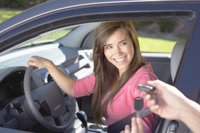 Car Locksmith — Girl Getting Her New Car Keys in Morristown, TN Car Locksmith — Girl Getting Her New Car Keys in Morristown, TN