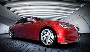 Auto Glass Service ─ Modern Red Metallic Sedan Car in Richmond, CA Auto Glass Service ─ Modern Red Metallic Sedan Car in Richmond, CA