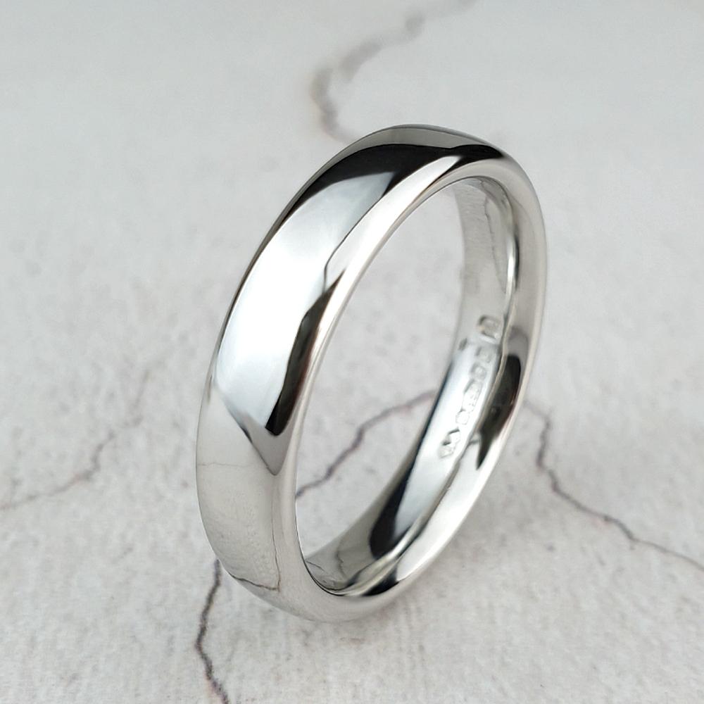Polished platinum soft court ring