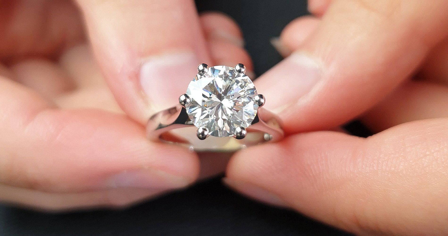 A handmade diamond solitaire engagement ring