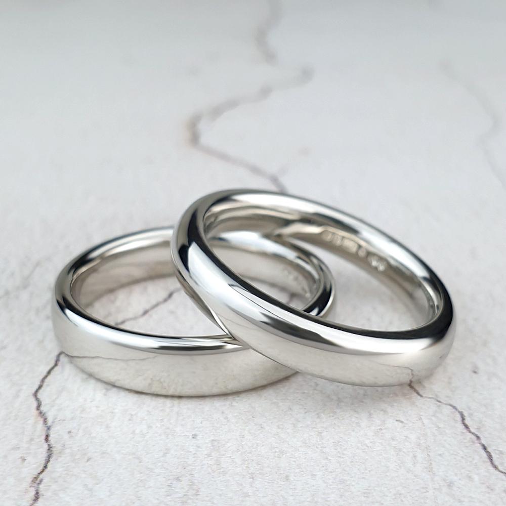 Two polished platinum court bands