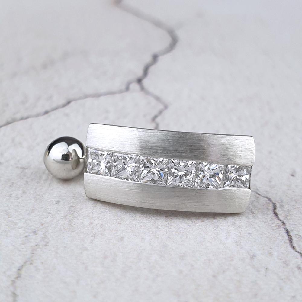 platinum belly bar with princess-cut diamonds