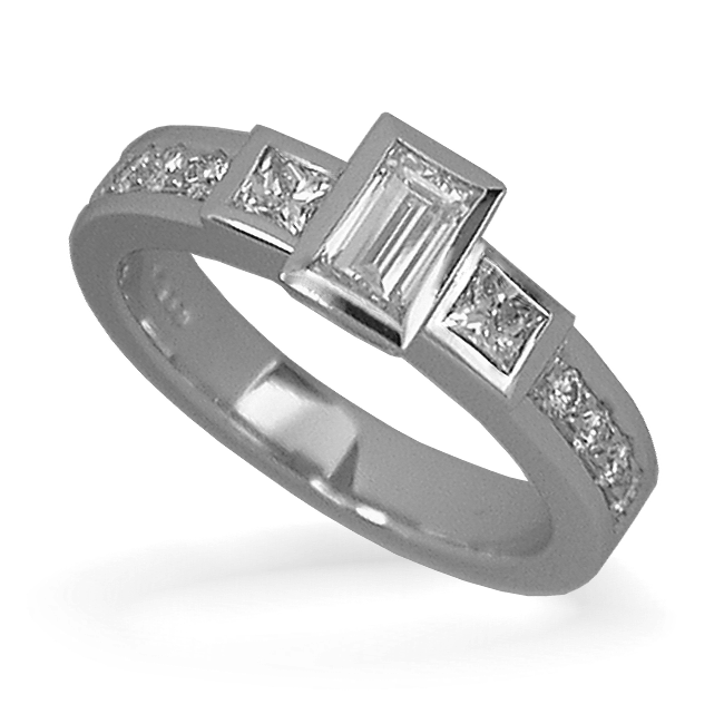 Contemporary engagement ring with central baguette with two princess cuts on a diamond-set band