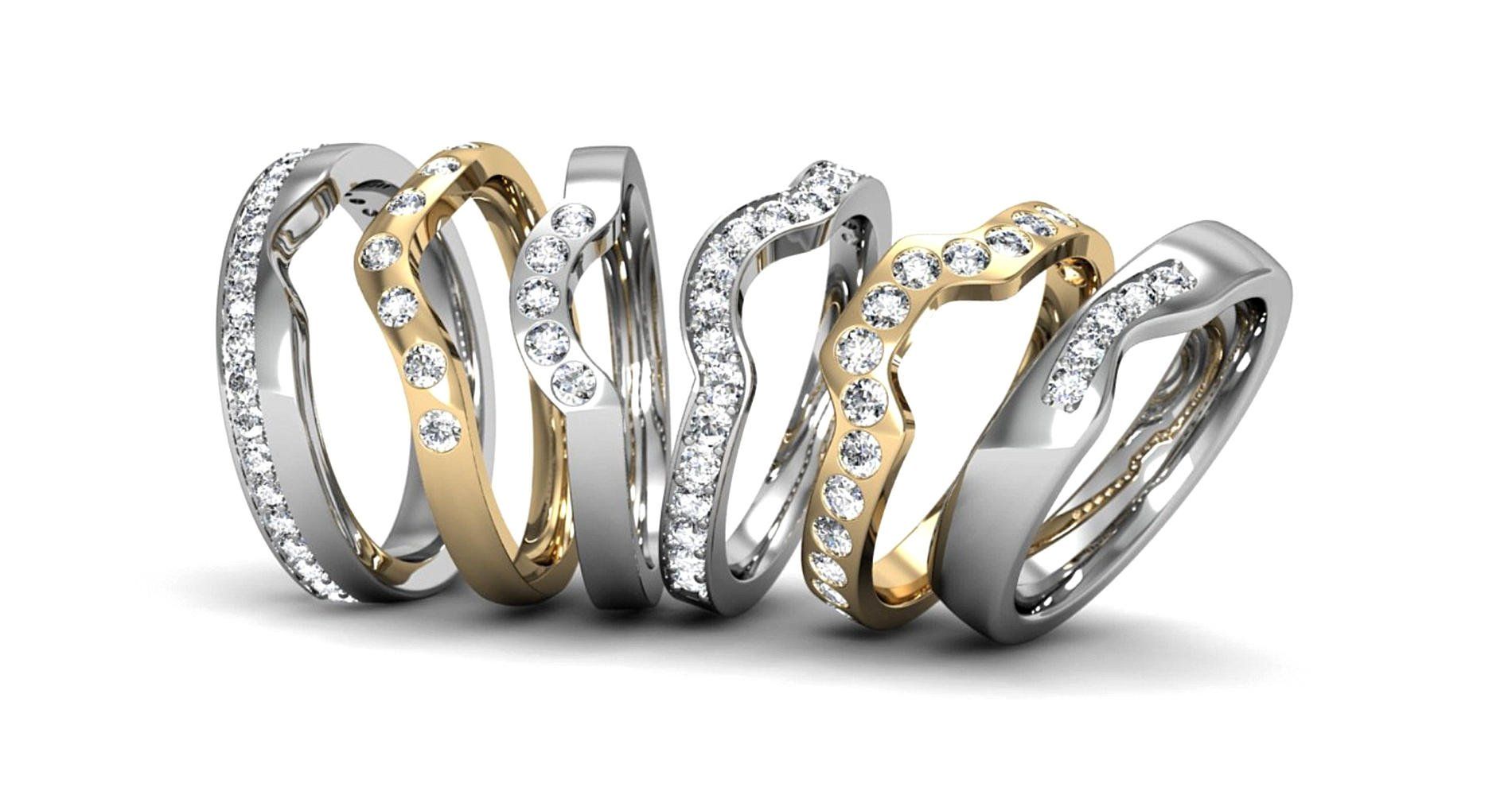 A selection of fitted wedding rings with diamonds