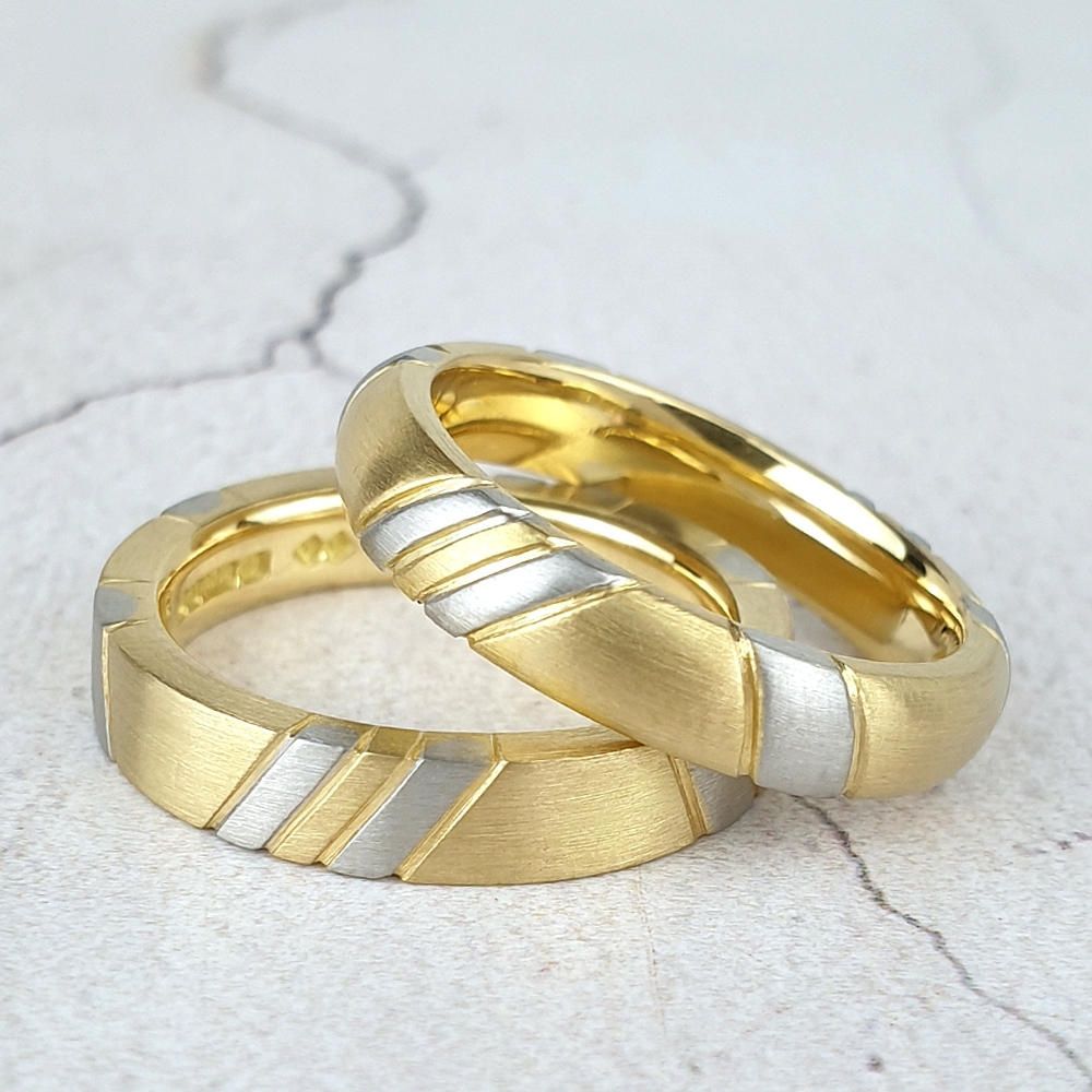 Full court and flat court bands with inlaid stripes of platinum