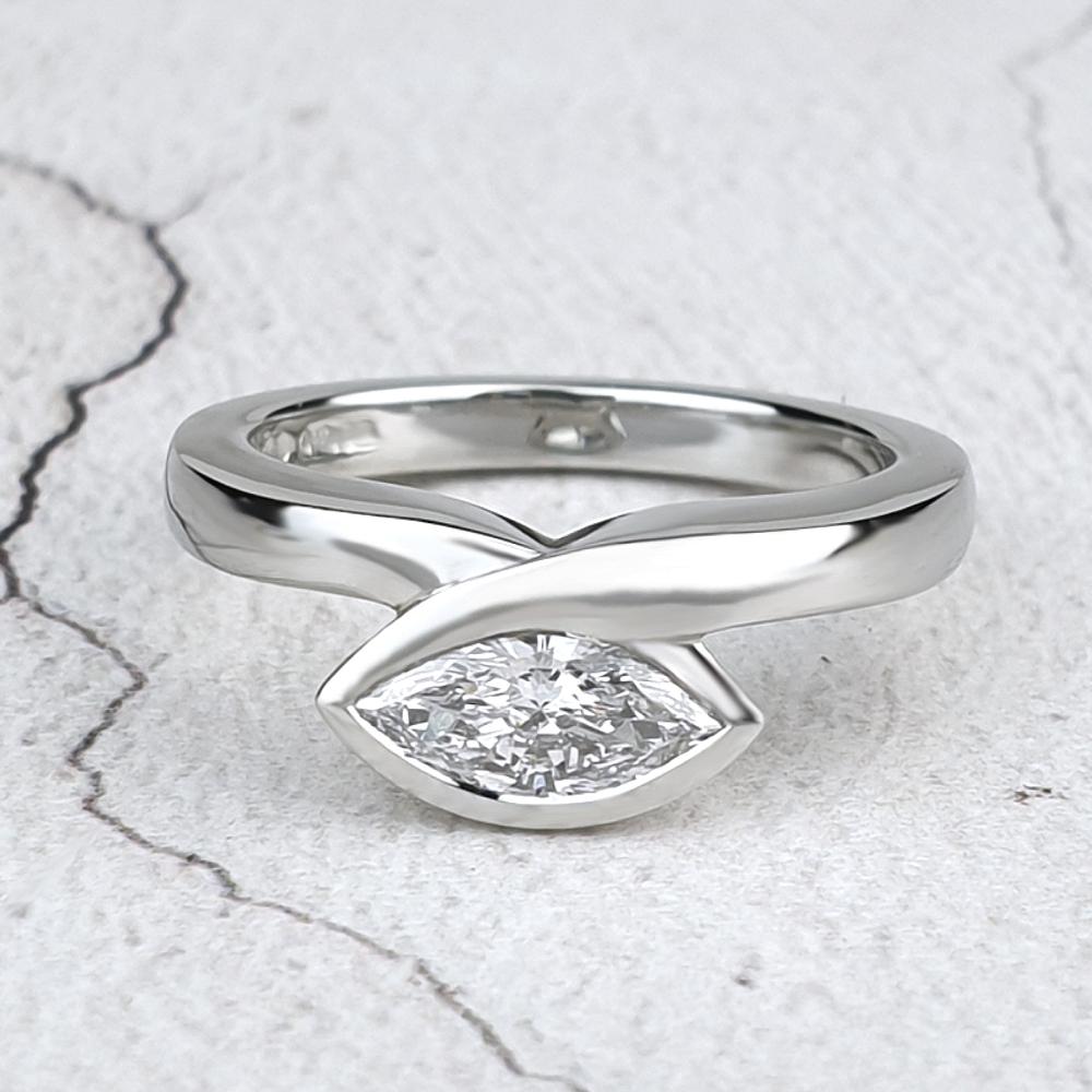 Infinity engagement ring with a marquise diamond Infinity engagement ring with a marquise diamond