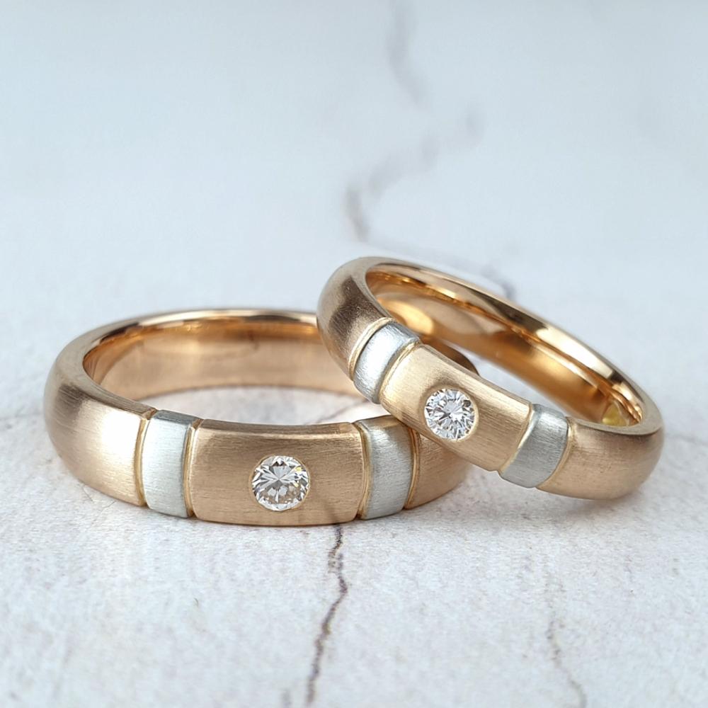 a pair of matching wedding rings A pair of bespoke wedding rings