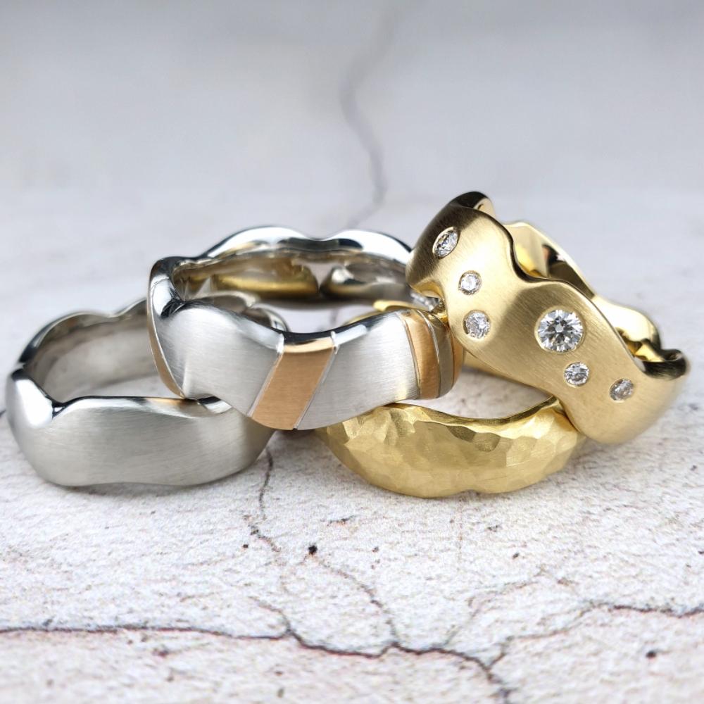 Hand carved wedding rings with different treatments Hand carved wedding rings with different treatments