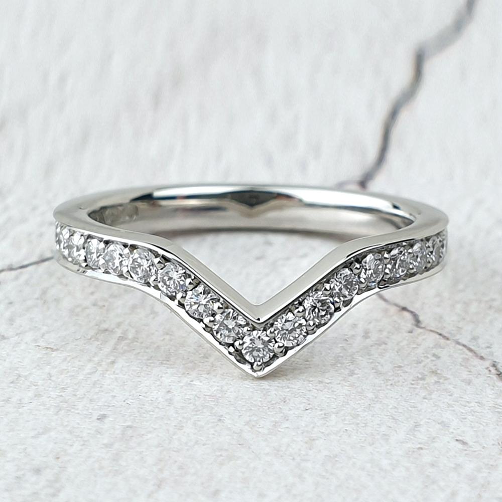 Platinum wishbone wedding band with micro-pavé diamonds