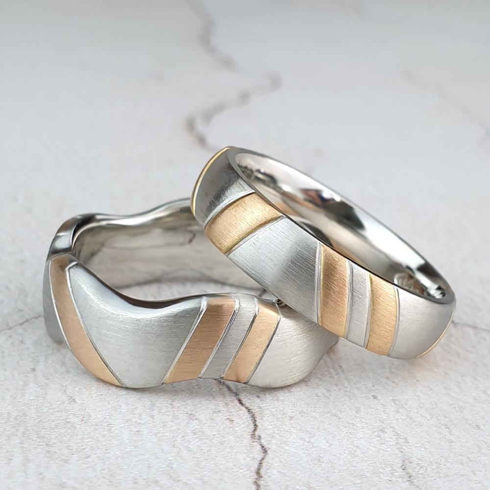 Platinum bands with gold stripes