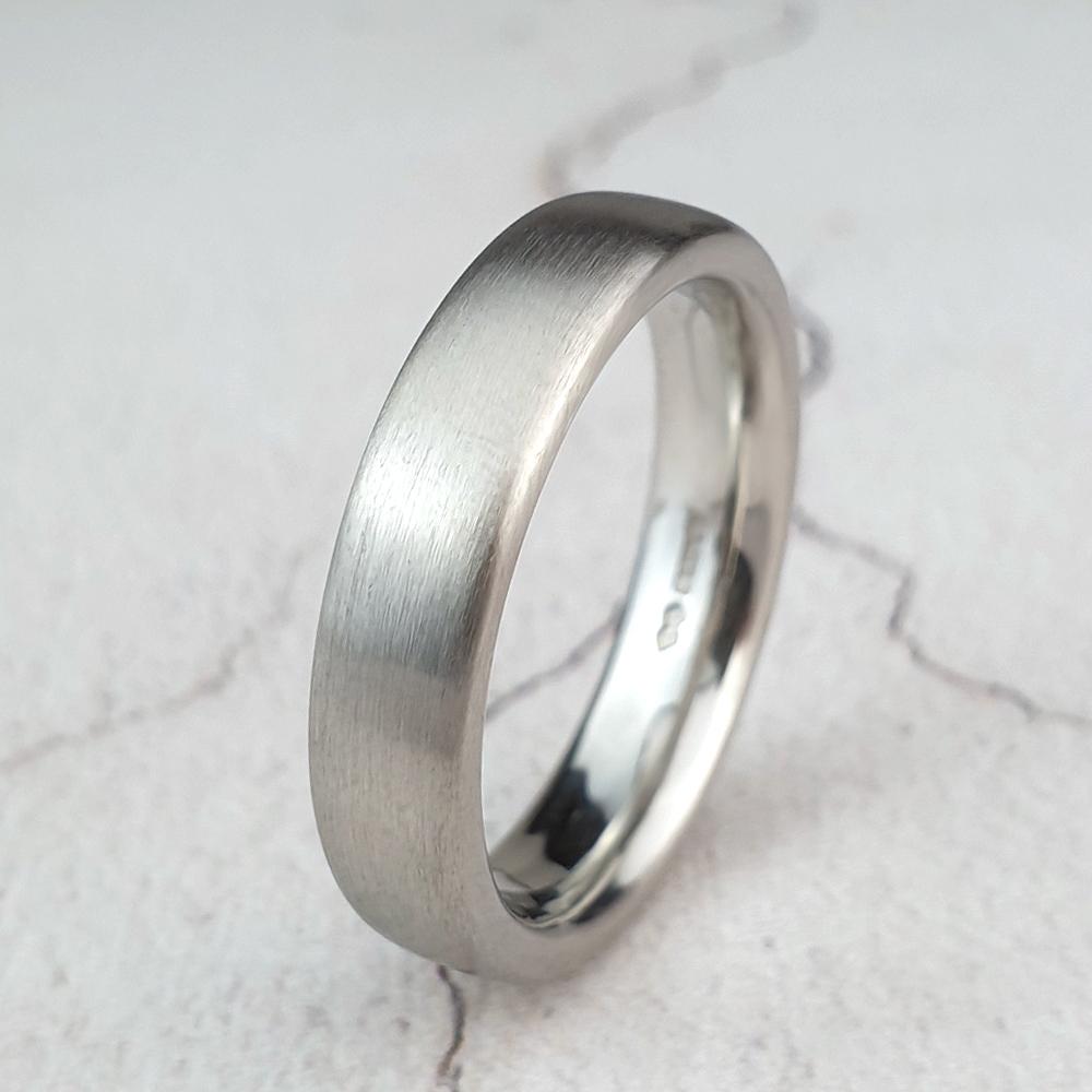 Mans contemporary platinum court ring with matte finish