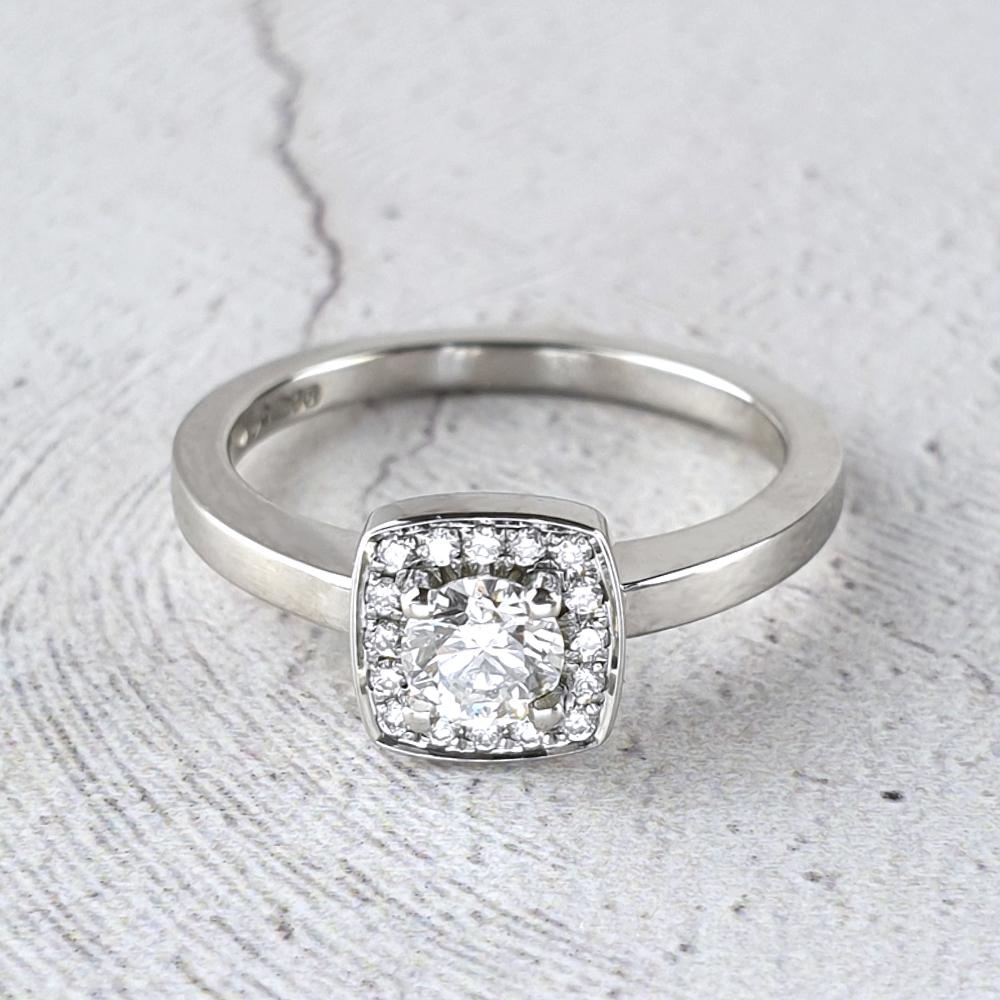 Cushion shaped halo ring with diamonds Cushion shaped halo ring with diamonds