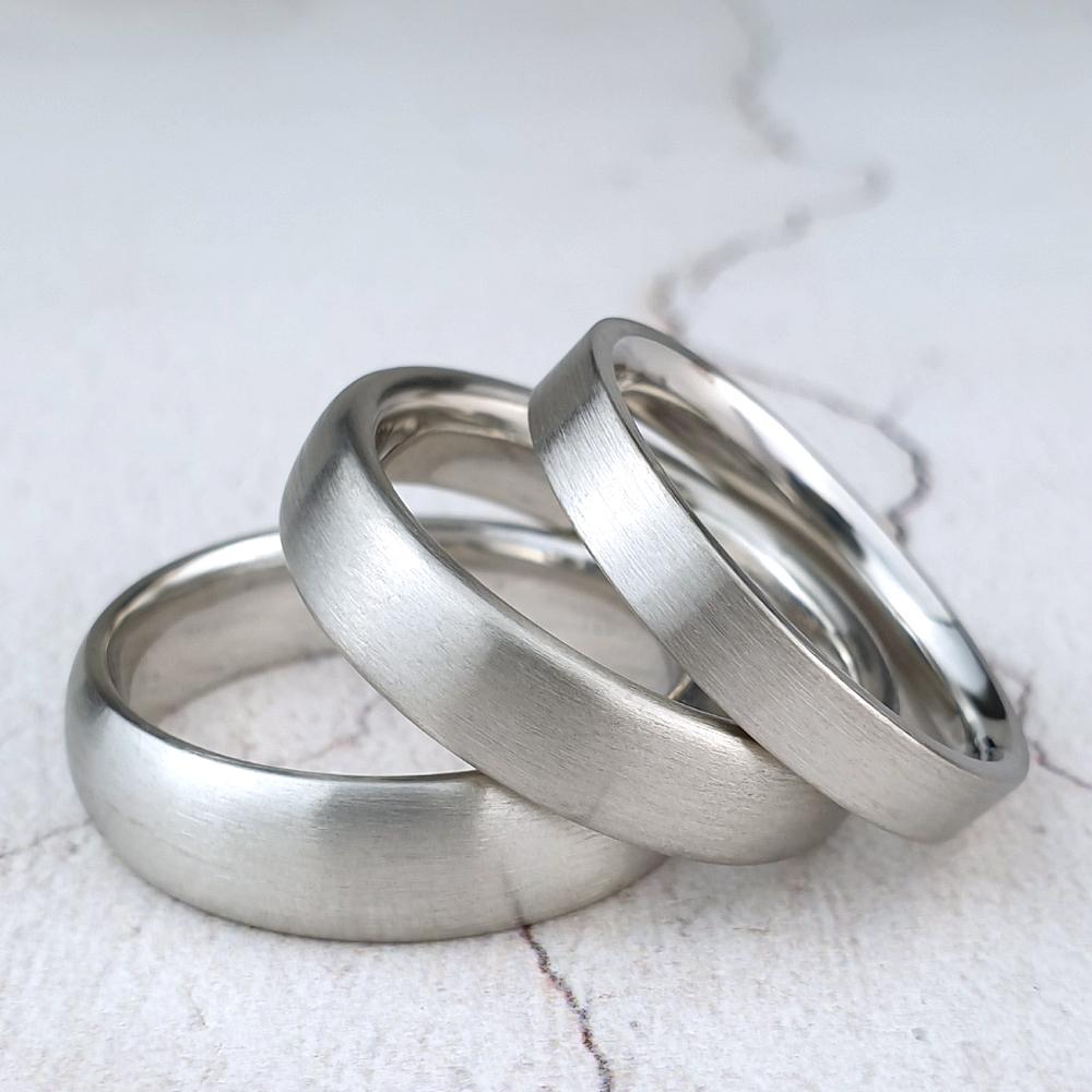 Three different matte platinum court bands