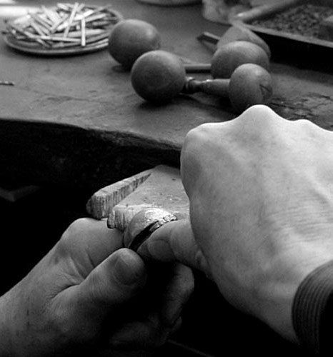 A goldsmith's bench A goldsmith at work
