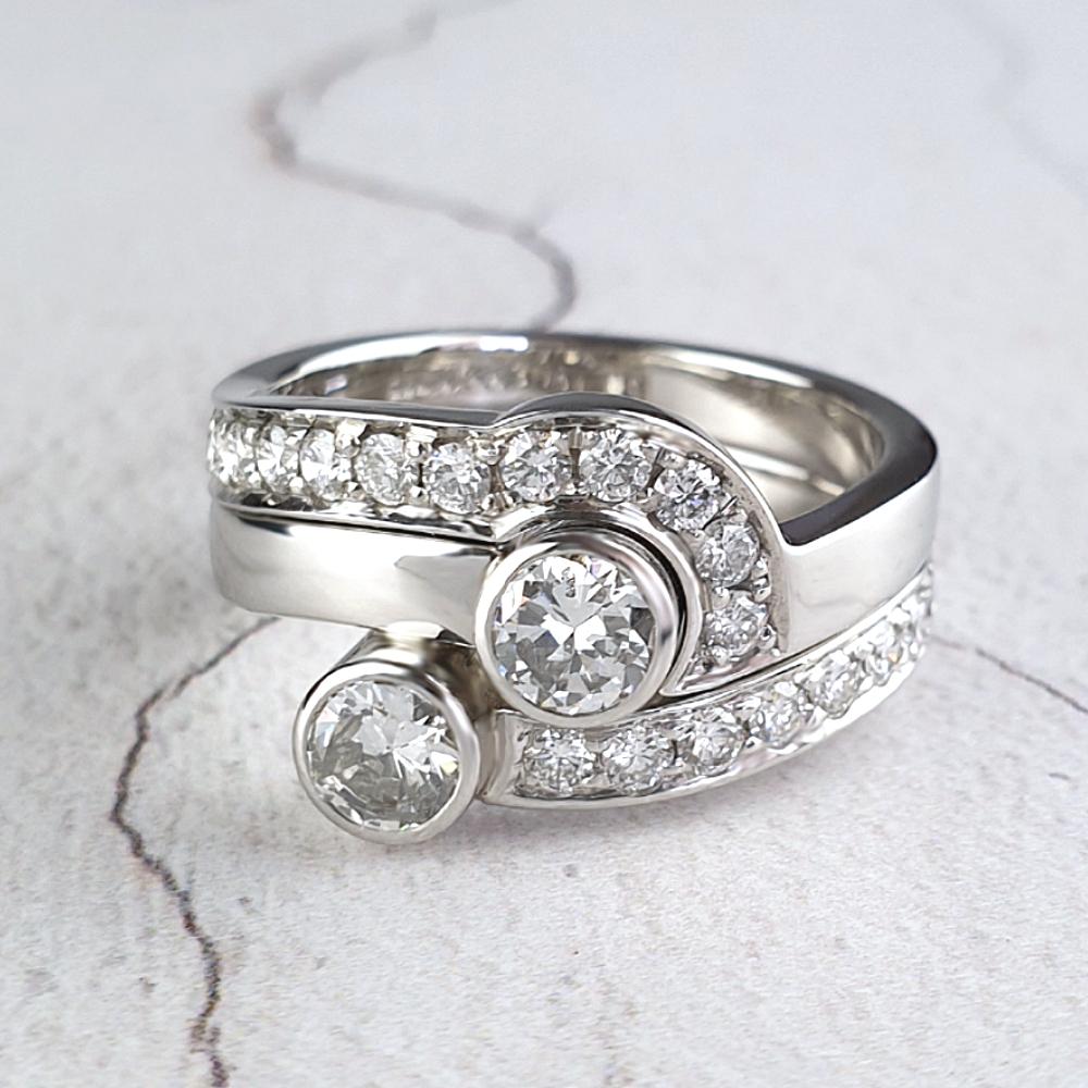 Engagement ring with a diamond-set fitted band Engagement ring with a diamond-set fitted band