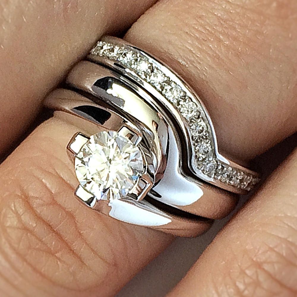 Customer engagement ring with fitted wedding and eternity rings