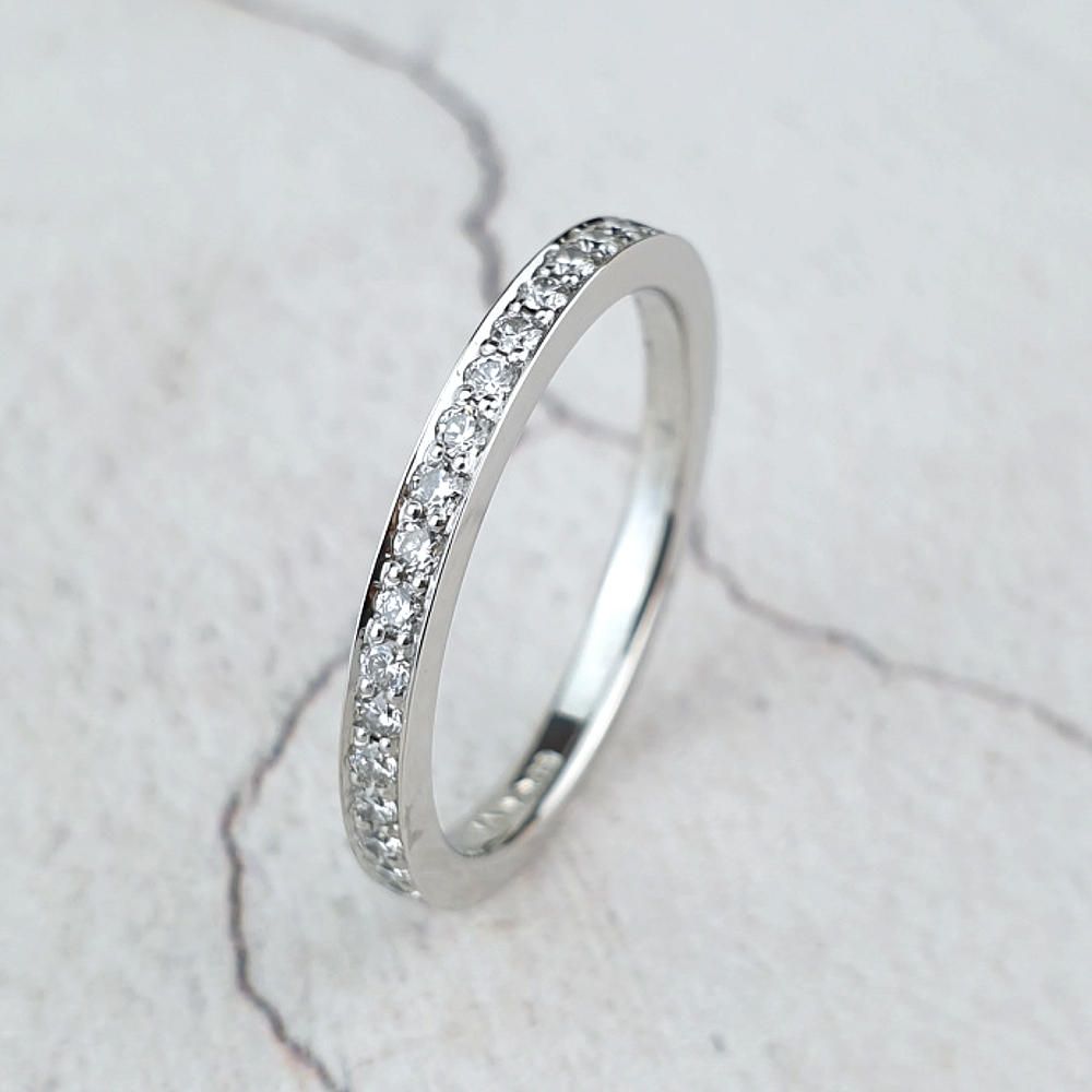 Narrow platinum band with micro-pavé diamonds
