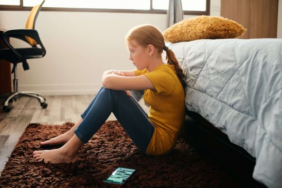 girl looking worried and thoughtful
