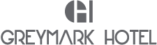 Greymark otelinin logosu gri ve beyazdır.