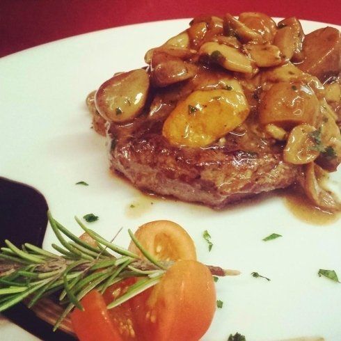 Steak with baked potatoes