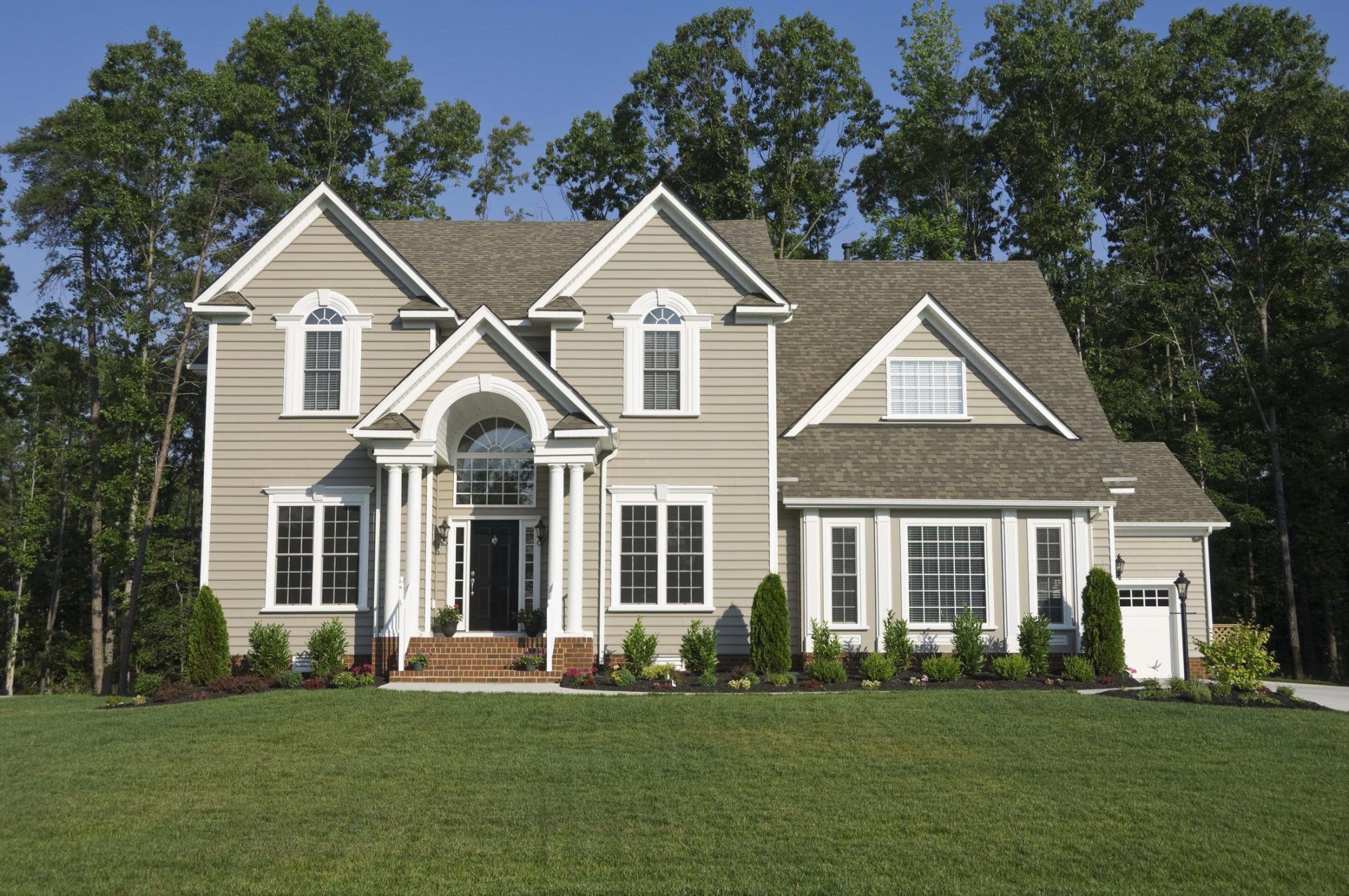 Roofing — luxury House with open fied in Columbus, OH