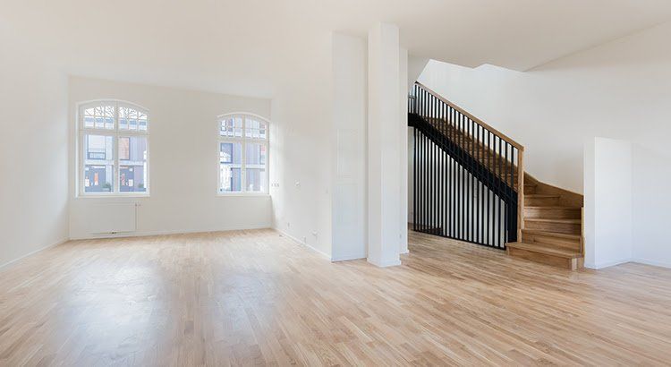 There is a spiral staircase in the middle of the room.