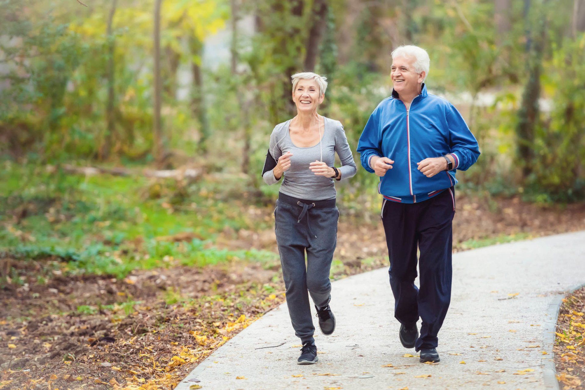 senior couple running