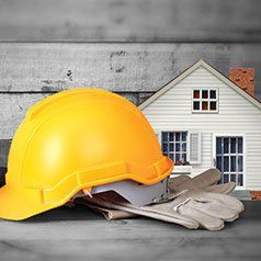 Roofing — Yellow Hardhat And Leather Gloves in Red Bank, NJ