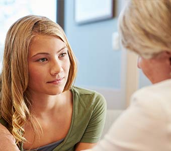 Medical Checkups — Girl Talking to Doctor in Dover, PA
