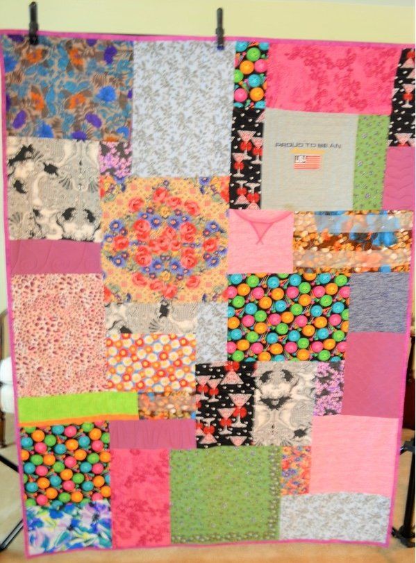 Memory quilt made from scarves, pajamas and robes
