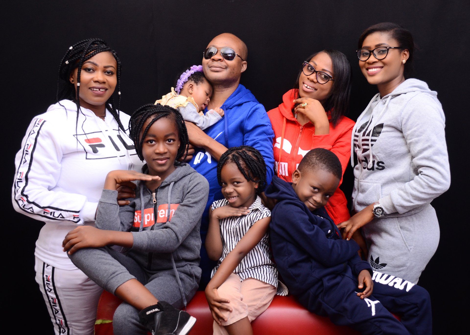 A group of people are posing for a picture together.
