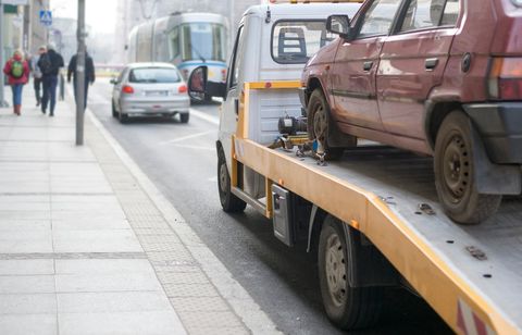Roadside assistance car towing truck in the city - Towing Company in South Weymouth, MA