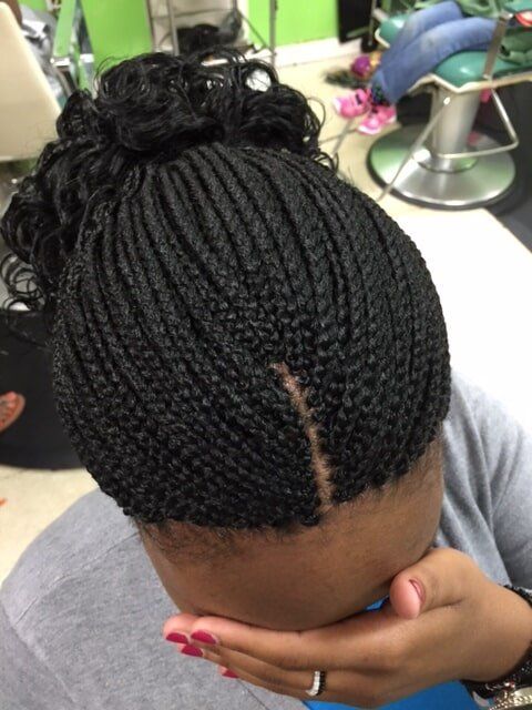 Curly Ponytail — Wilmington, DE — Tess African Hair Braiding & Beauty Supply