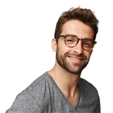 A man wearing glasses and a grey shirt is smiling
