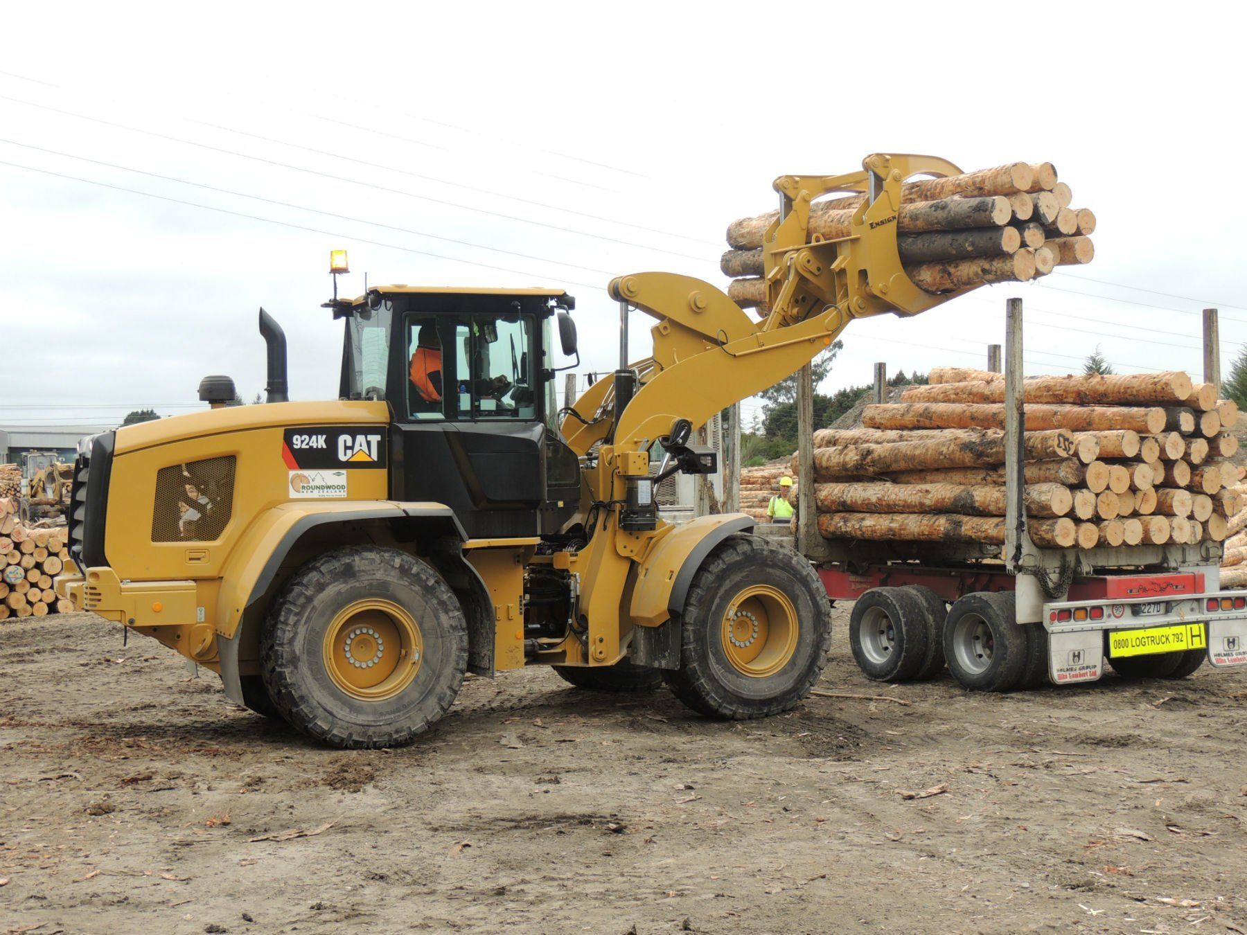Men operating a machine
