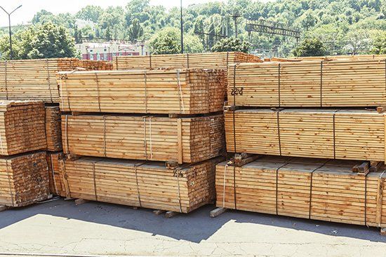 Stacked piles of timber product - Lumber Yard in Peoria, IL Stacked piles of timber product - Lumber Yard in Peoria, IL